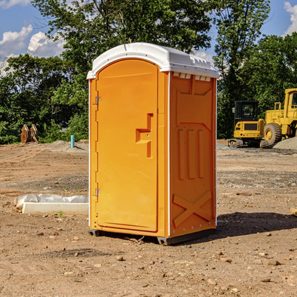 how often are the portable restrooms cleaned and serviced during a rental period in Tira